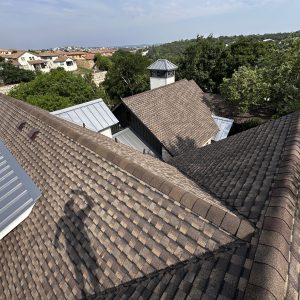 Balcones Roofing & RemodelingGAF Timberline UHDZ in Barkwood & 24-Gauge Pre-Weathered Galvalume Standing -Seam Metal - Lakeway, Texas