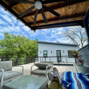 Balcones Roofing & Remodeling2-2.Steel Pergola with Standing Seam Metal Roof atop a floating Fortress Deck & 60-mil TPO - Austin, Texas