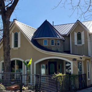 Balcones Roofing & Remodeling24-Gauge 1" Standing Seam Metal Roof in McElroy Dark Bronze - Austin, Texas