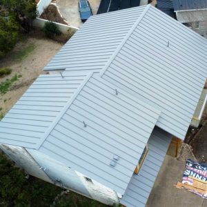 Balcones Roofing & Remodeling24-Gauge 1.5" Standing-Seam Metal in Berridge Zinc Gray - Lakeway, Texas