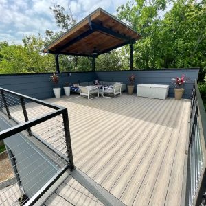 Balcones Roofing & RemodelingSteel Pergola with Standing Seam Metal Roof atop a floating Fortress Deck & 60-mil TPO - Austin, Texas
