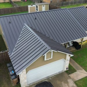 Balcones Roofing & Remodeling24-Gauge 1.5" Standing-Seam Metal Roof in Dark Bronze - Austin, Texas